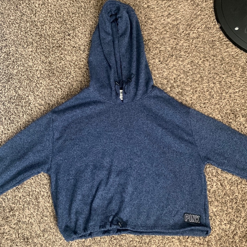a pink blue hoodie with adjustable band to fit the waist.  going for 20$